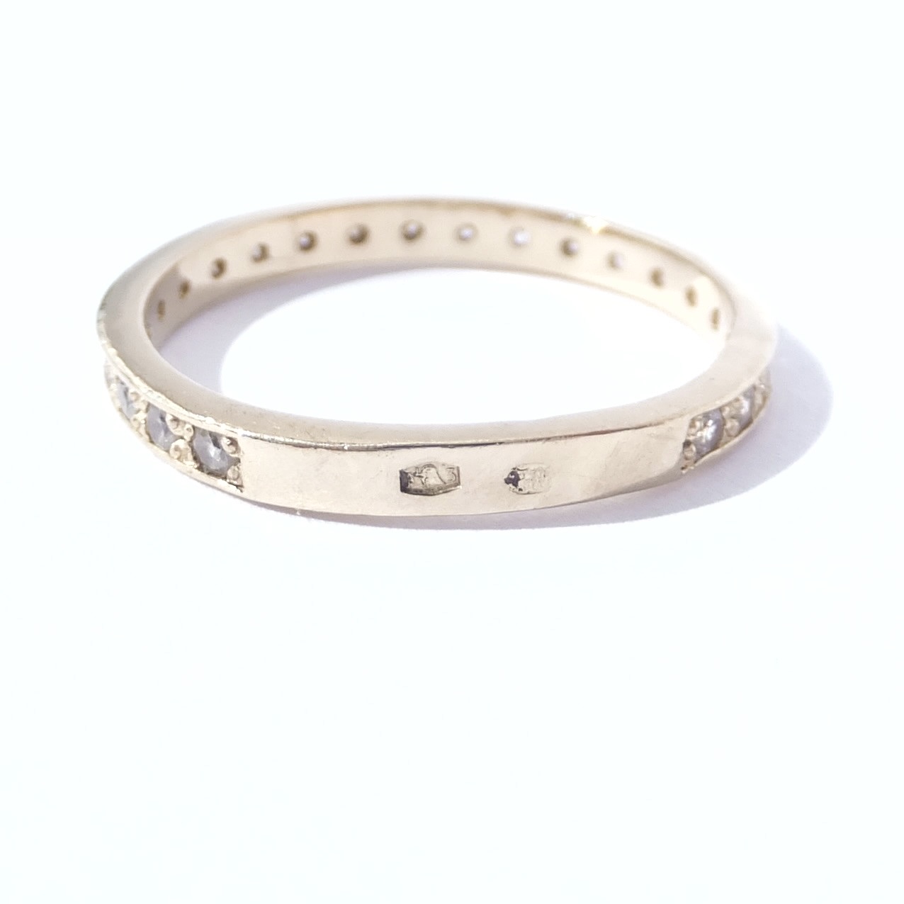 Zlatý prsten se zirkony, 14K 585/1000, váha 1,87 g, použité zlato